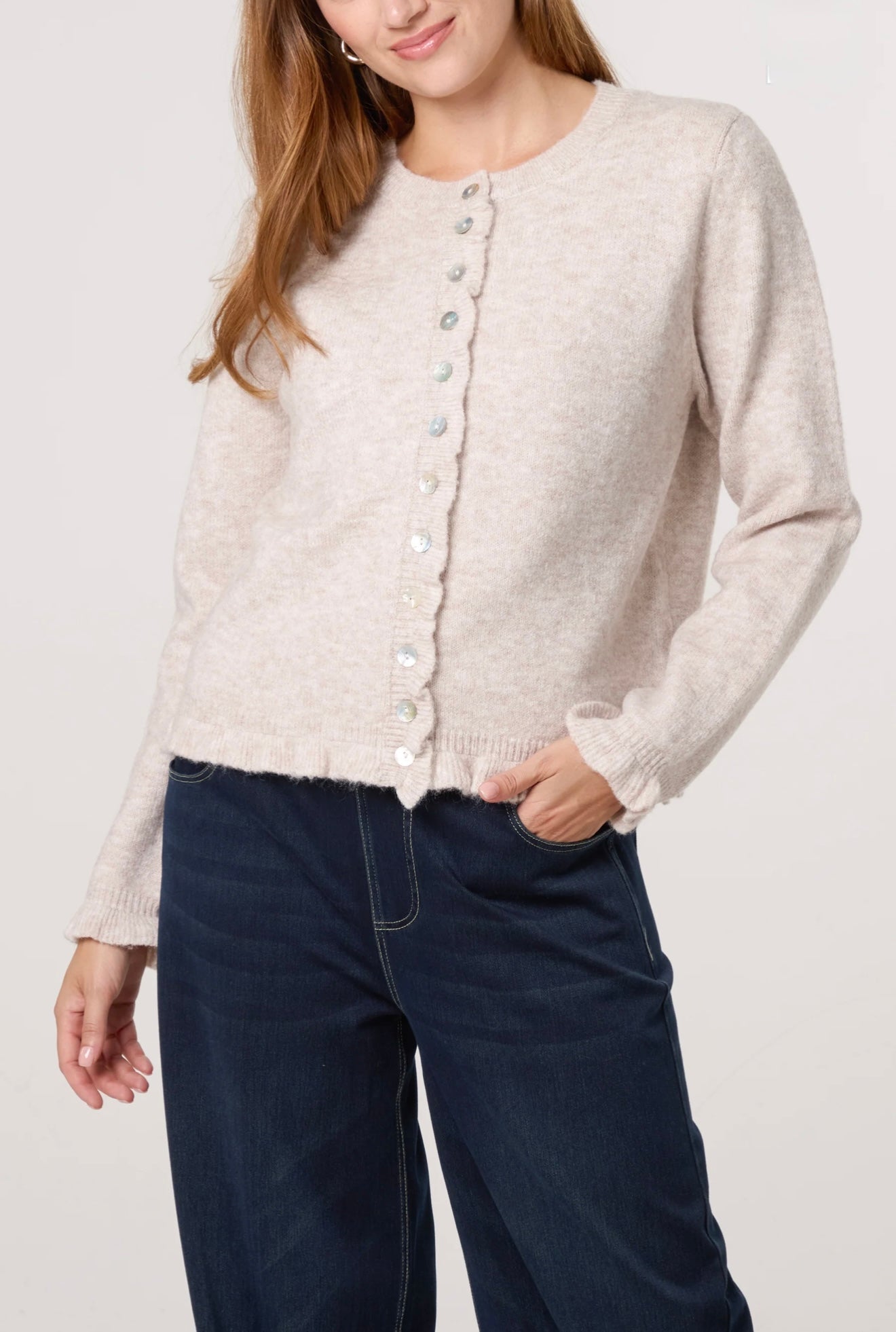 Italian knit cardigan in stone melange with ruffle cuffs, ruffle hem, and pearl button front – Brina by Aria Italian Style Boutique
