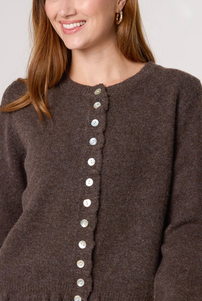 Women’s coffee knit cardigan with ruffle trim and button front