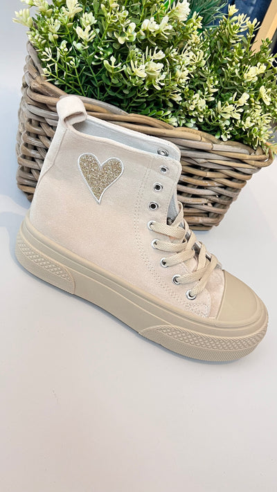 beige tone and a sparkly heart on each side, this trainers are stunning.